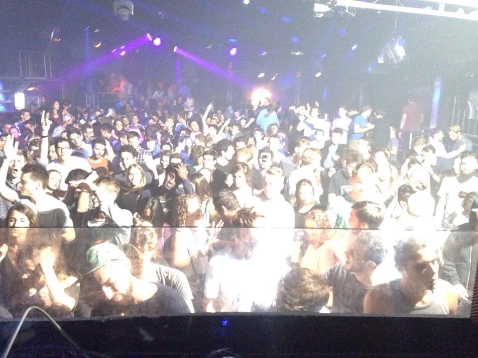 Le Singe — DJ booth view over a packed dancefloor